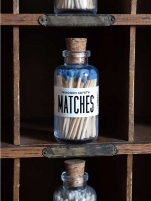 Mini Apothecary Vintage Blue Matches housed in a vintage apothecary-style glass jar with a cork top. A practical and stylish accessory for lighting candles, incense, or fireplaces.