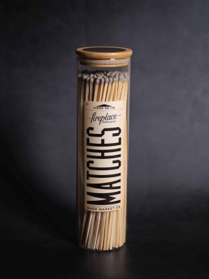 Extra-long gray fireplace matches in glass apothecary bottle with wood top