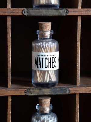 Mini Apothecary Vintage White Matches housed in a vintage apothecary-style glass jar with a cork top. A practical and stylish accessory for lighting candles, incense, or fireplaces.
