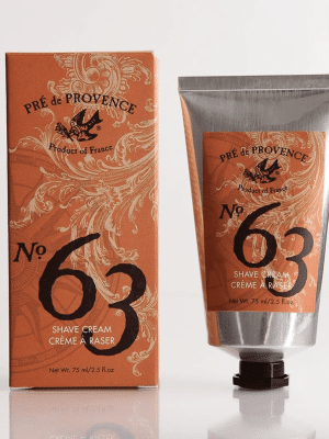 Close-up of Shaving Cream No. 63 tube and box by Pré de Provence, featuring elegant brown and silver packaging