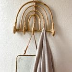 be made hays, ks. arched rattan wall hanging. wall hooks. boho home decor