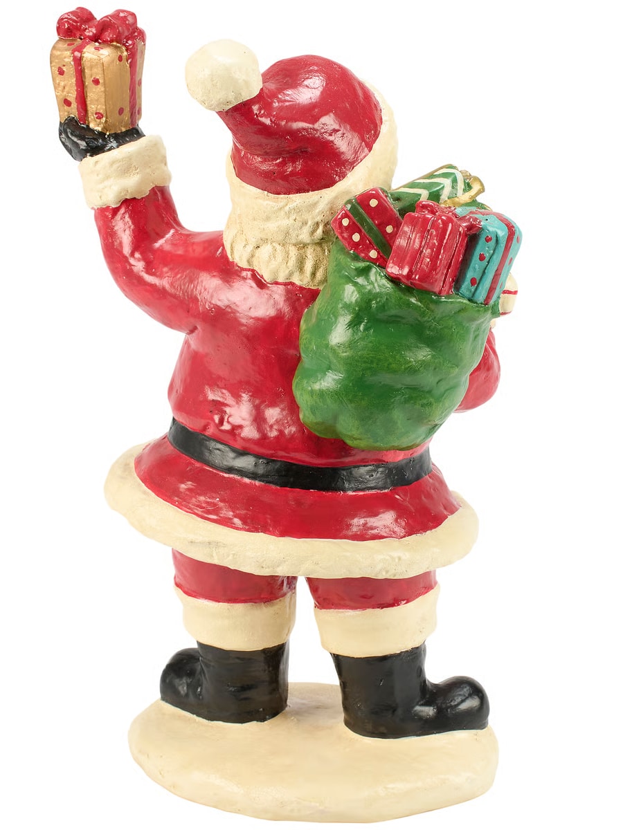 Back view of Santa figurine showing green sack filled with colorful presents.