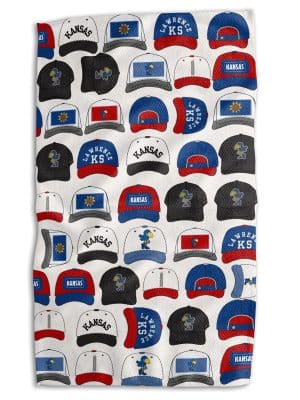 KU Hats Tea Towel with rows of Kansas Jayhawk-inspired hats in red, blue, black, and white, oversized microfiber waffle fabric.