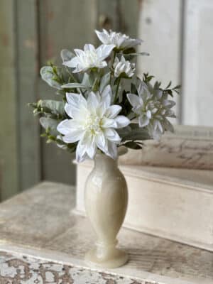 White Cottage Blooms Bundle arranged in a ceramic vase with layered white blooms and mixed greenery.