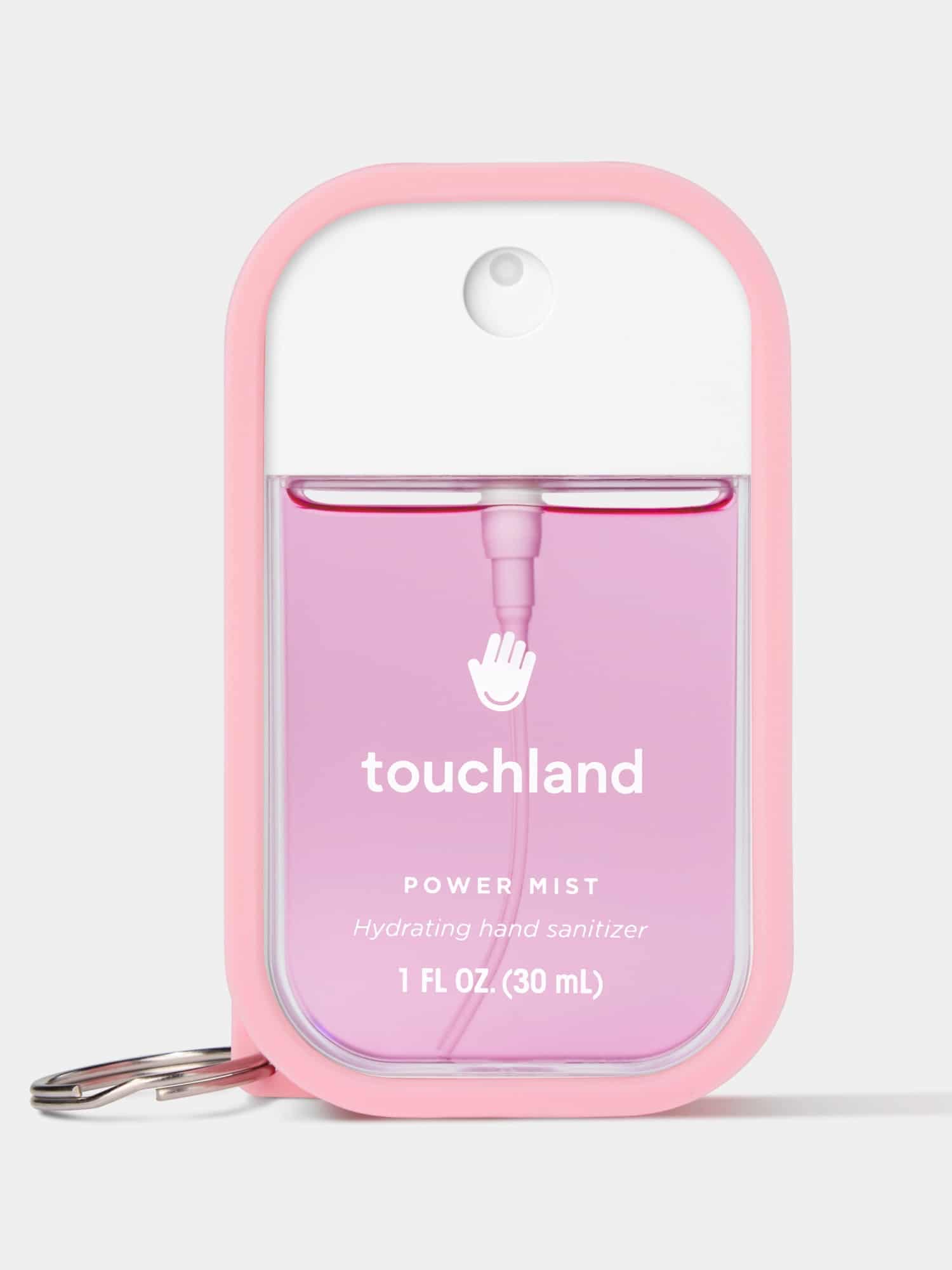 Touchland sanitizer placed inside the pink silicone case with key ring attached.