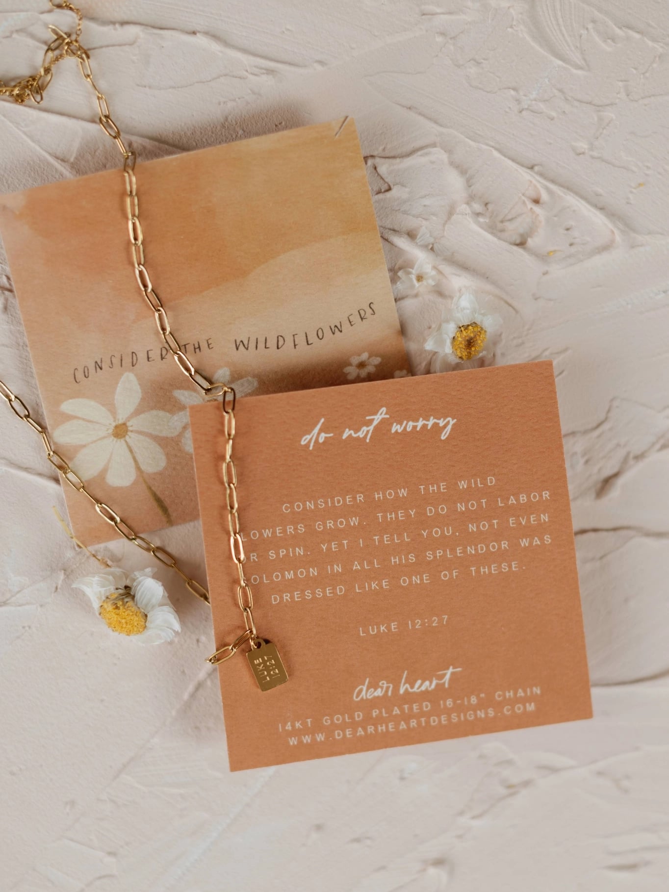 Gold Do Not Worry Mini Tag Necklace shown on scripture verse card with chain detail