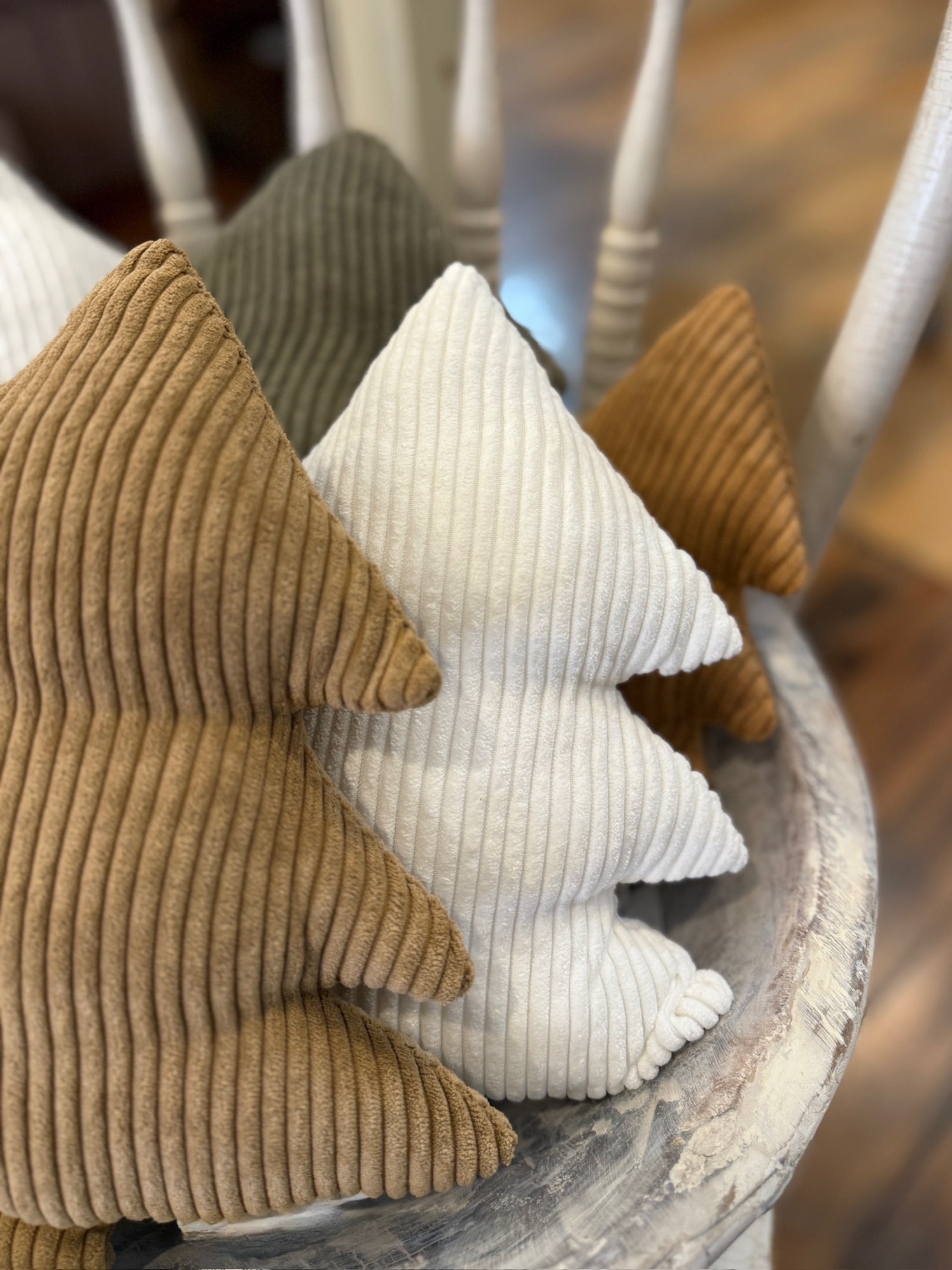 Large White Corduroy Stuffed Tree displayed with other neutral-toned corduroy trees in a rustic bowl, adding cozy texture to holiday décor.