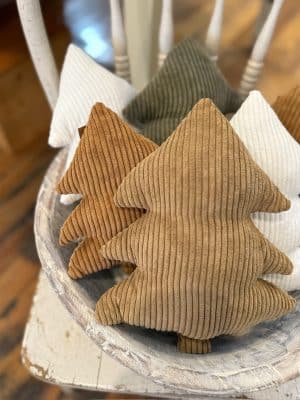 Large Cookie Corduroy Stuffed Tree in a soft brown hue displayed with other ribbed corduroy trees in white and green tones, styled in a rustic wood bowl.