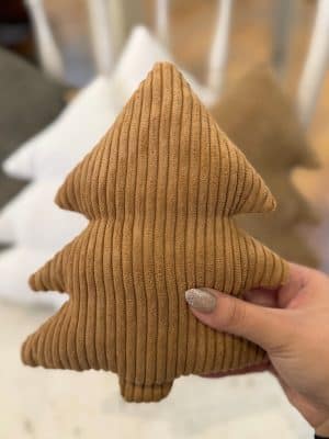 Small Camel Corduroy Stuffed Tree made of soft ribbed corduroy fabric in a warm camel brown color, held in hand with neutral holiday décor in the background.