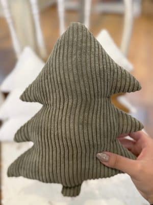 Large Evergreen Corduroy Stuffed Tree made of soft ribbed corduroy fabric in deep green, held in hand against a neutral holiday background.
