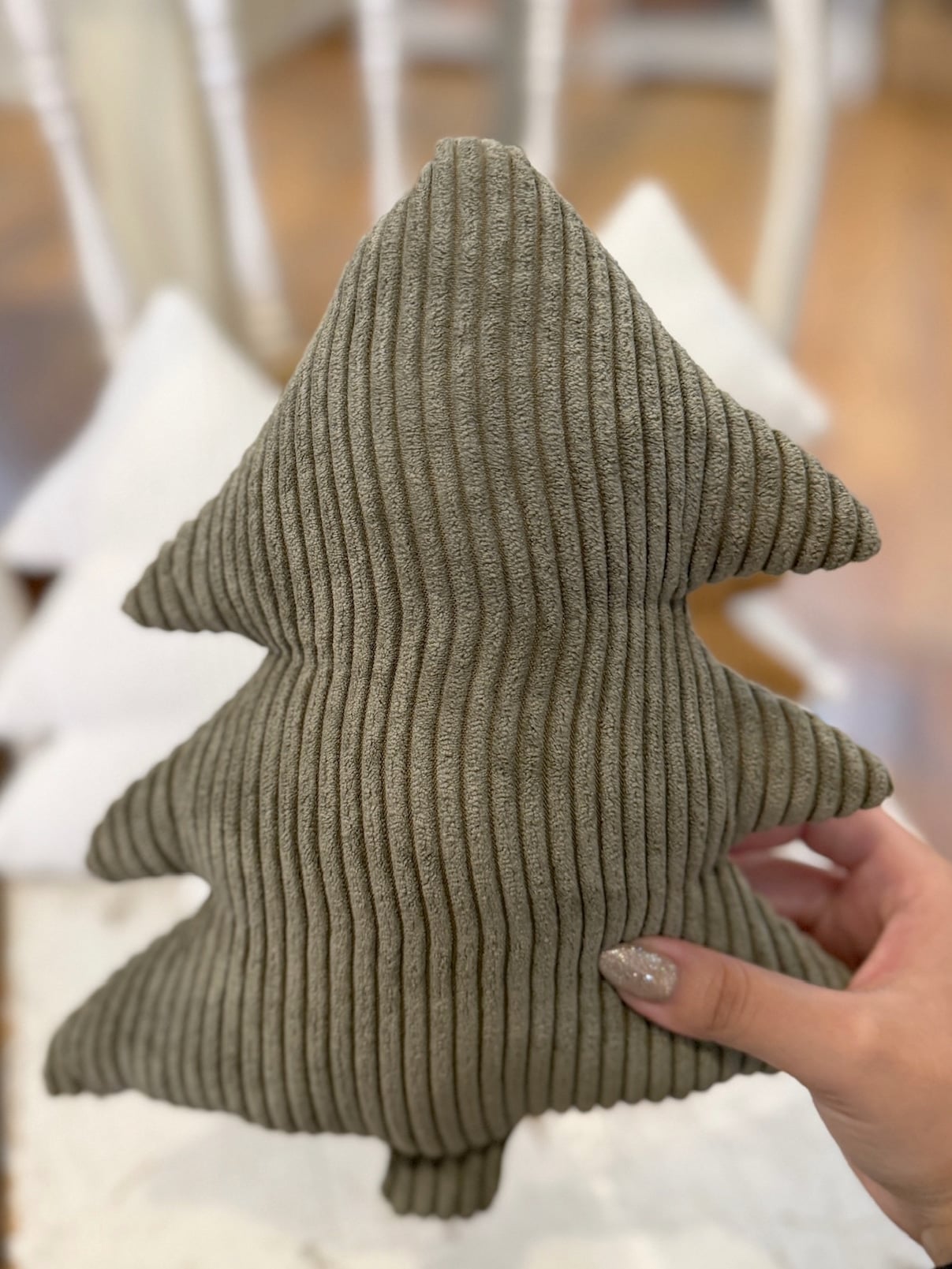 be-made-hays-ks-large-evergreen-corduroy-stuffed-tree-pillow Large Evergreen Corduroy Stuffed Tree made of soft ribbed corduroy fabric in deep green, held in hand against a neutral holiday background.