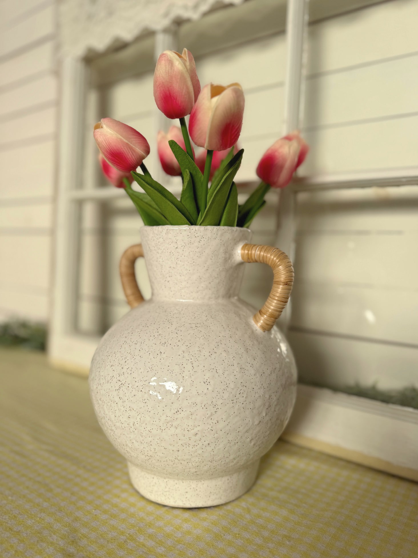 be-made-hays-ks-rattan-wrapped-handle-vase-medium-front Off-White Rattan Handle Vase Medium With Flared Spout Filled With Faux Tulips