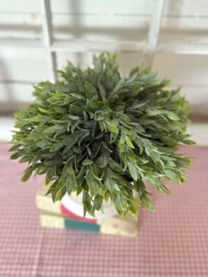 Faux Greenery Half Sphere With Powdered Leaves Styled on Books