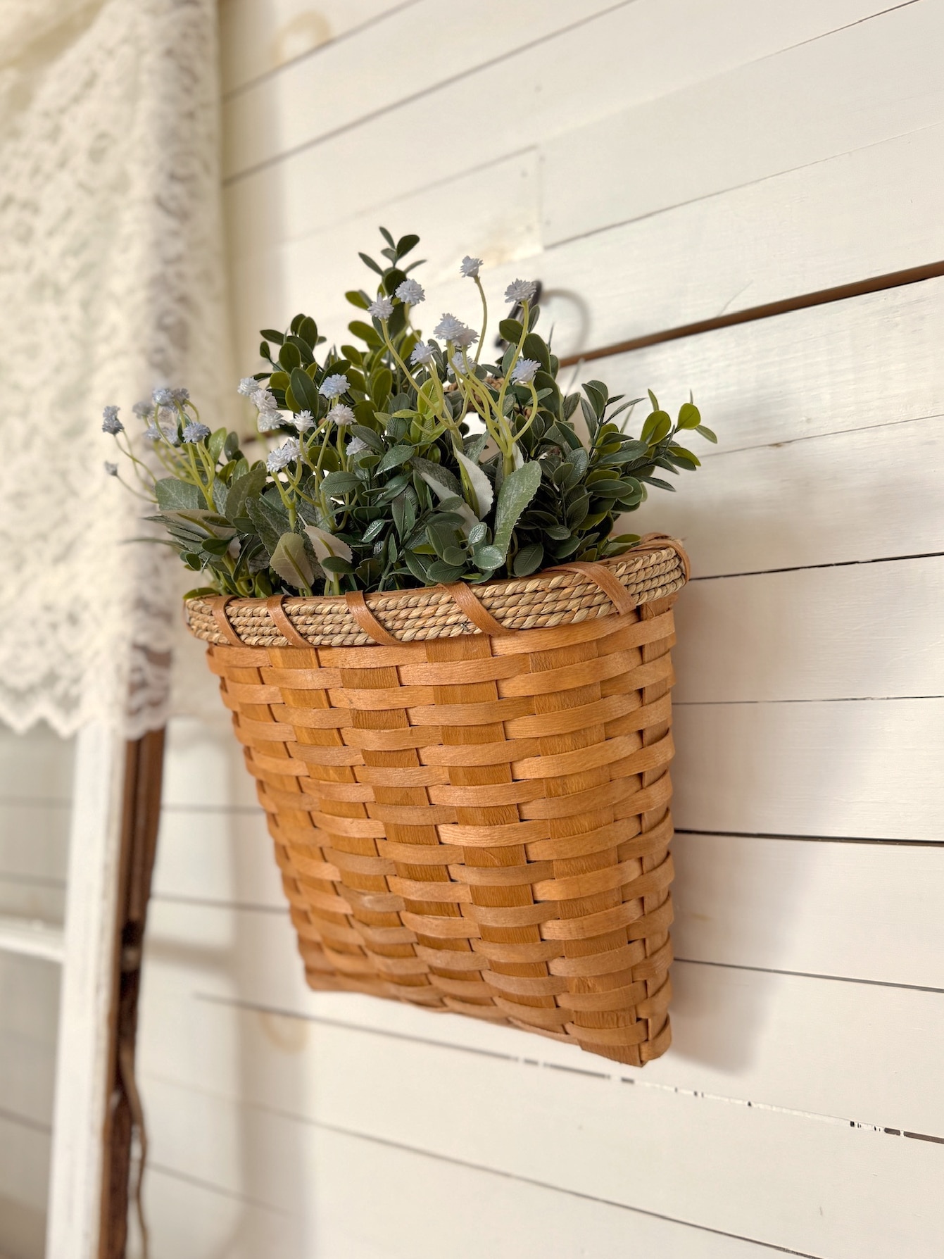 Small Chipwood Wall Basket Styled With Boxwood Greenery and Blue Mini Star Floral Bundle