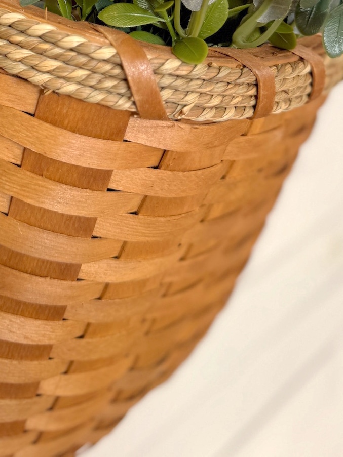 Hanging Chipwood Basket Close-Up Showing Woven Wood Texture and Braided Rim