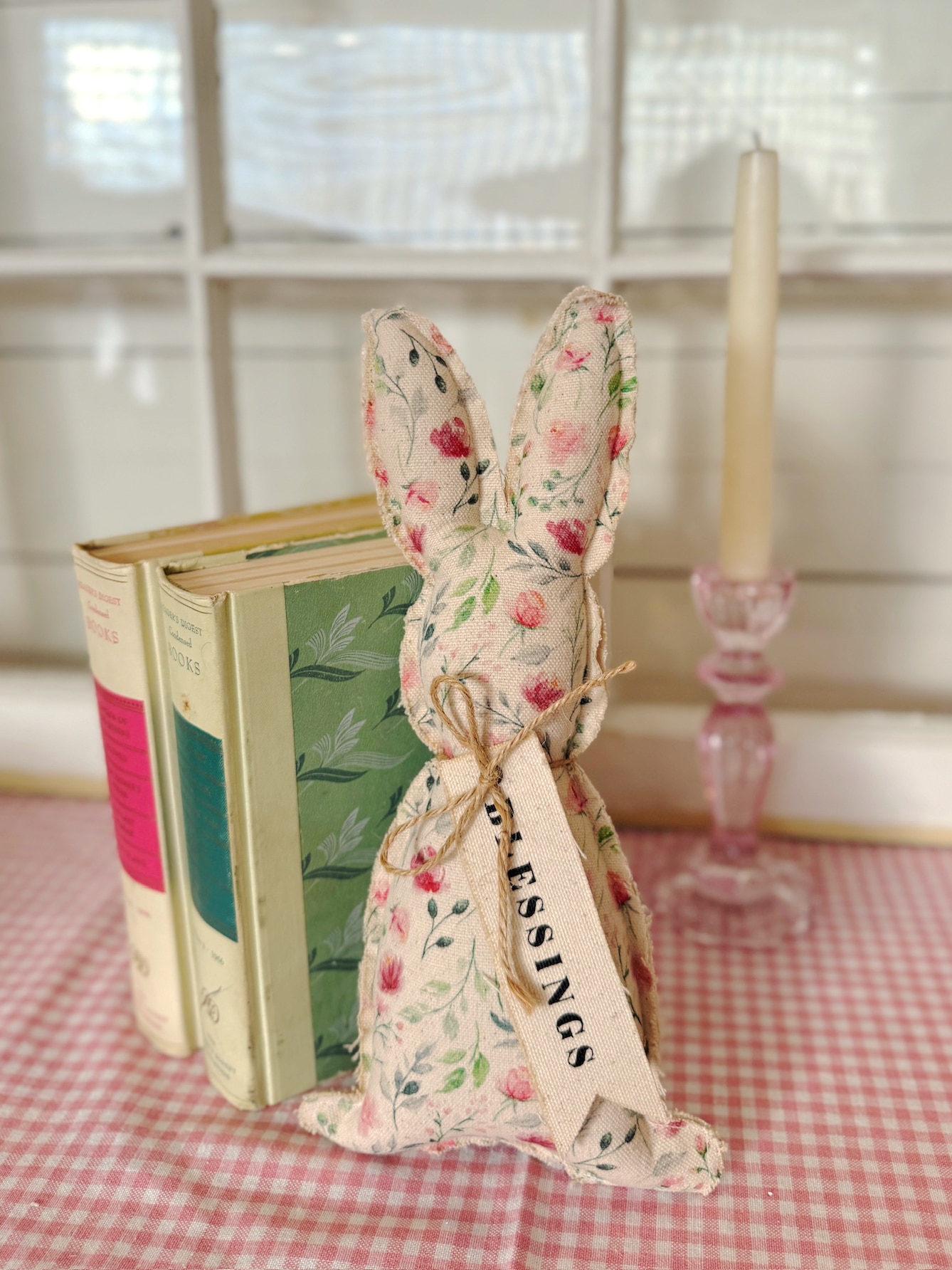 Spring Fabric Bunny Decor Styled With Vintage Books and Pink Candle Holder