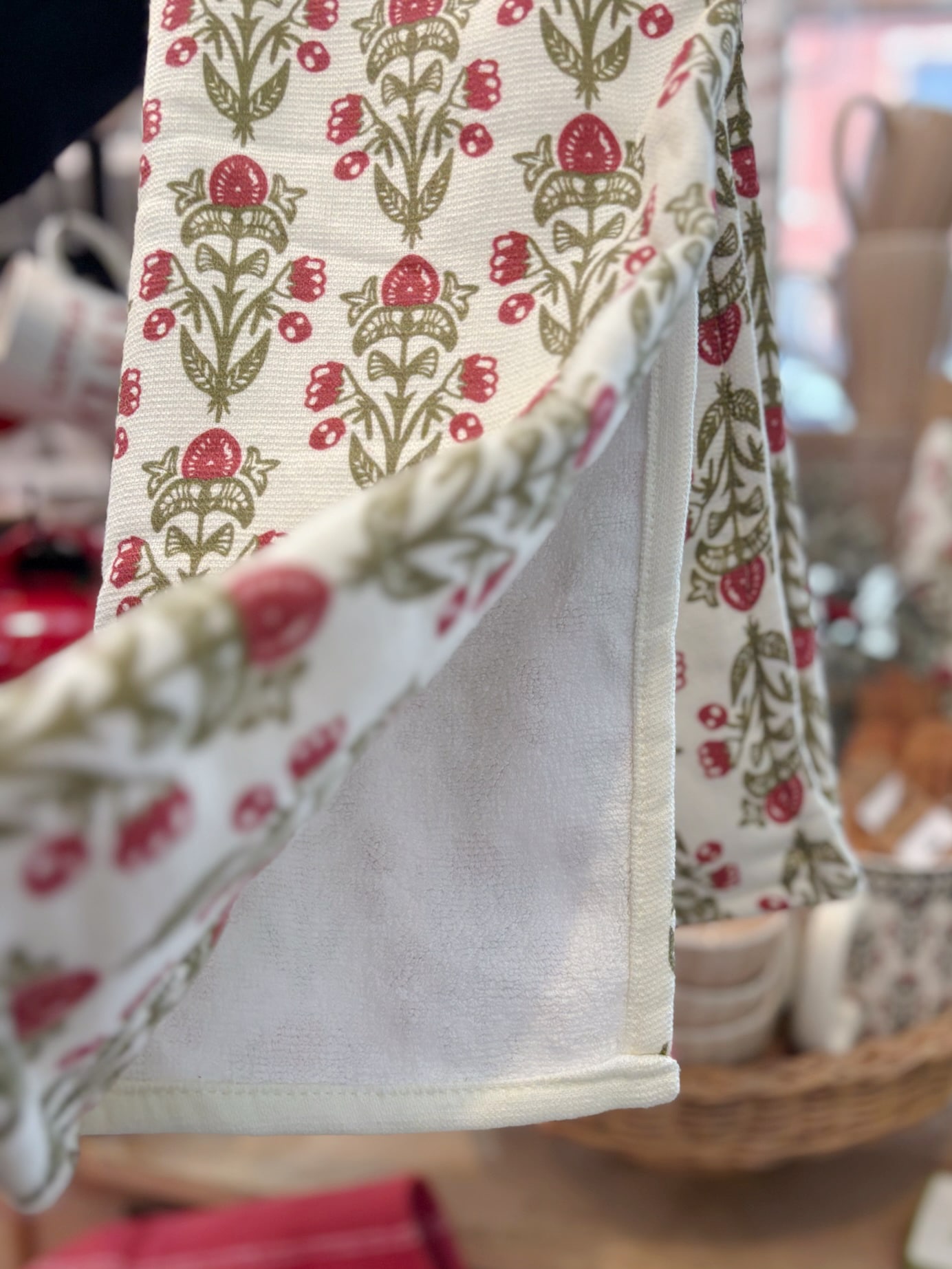 Close-up of the floral block kitchen towel showing the terrycloth backing.