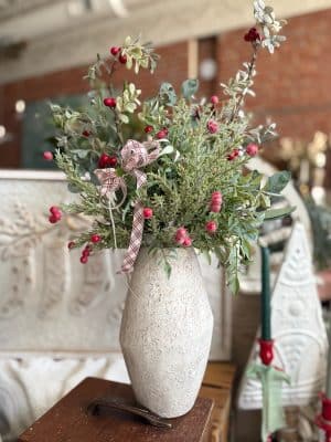 Large Rustic White Vase styled with Eucalyptus and Berries Floral Picks and Glittered Pine Berries Picks for a festive winter arrangement.