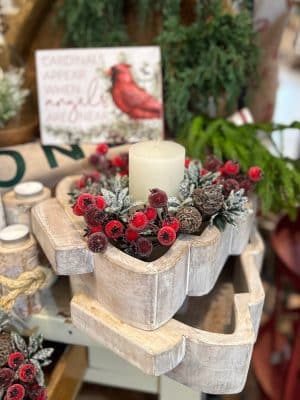 Small whitewashed wooden Christmas tree dough bowl styled with a Frosted Berry Candle Ring and pillar candle, surrounded by festive holiday decor.