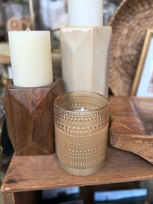 Elegant champagne glass flameless candle styled with dotted pattern for holiday or everyday use