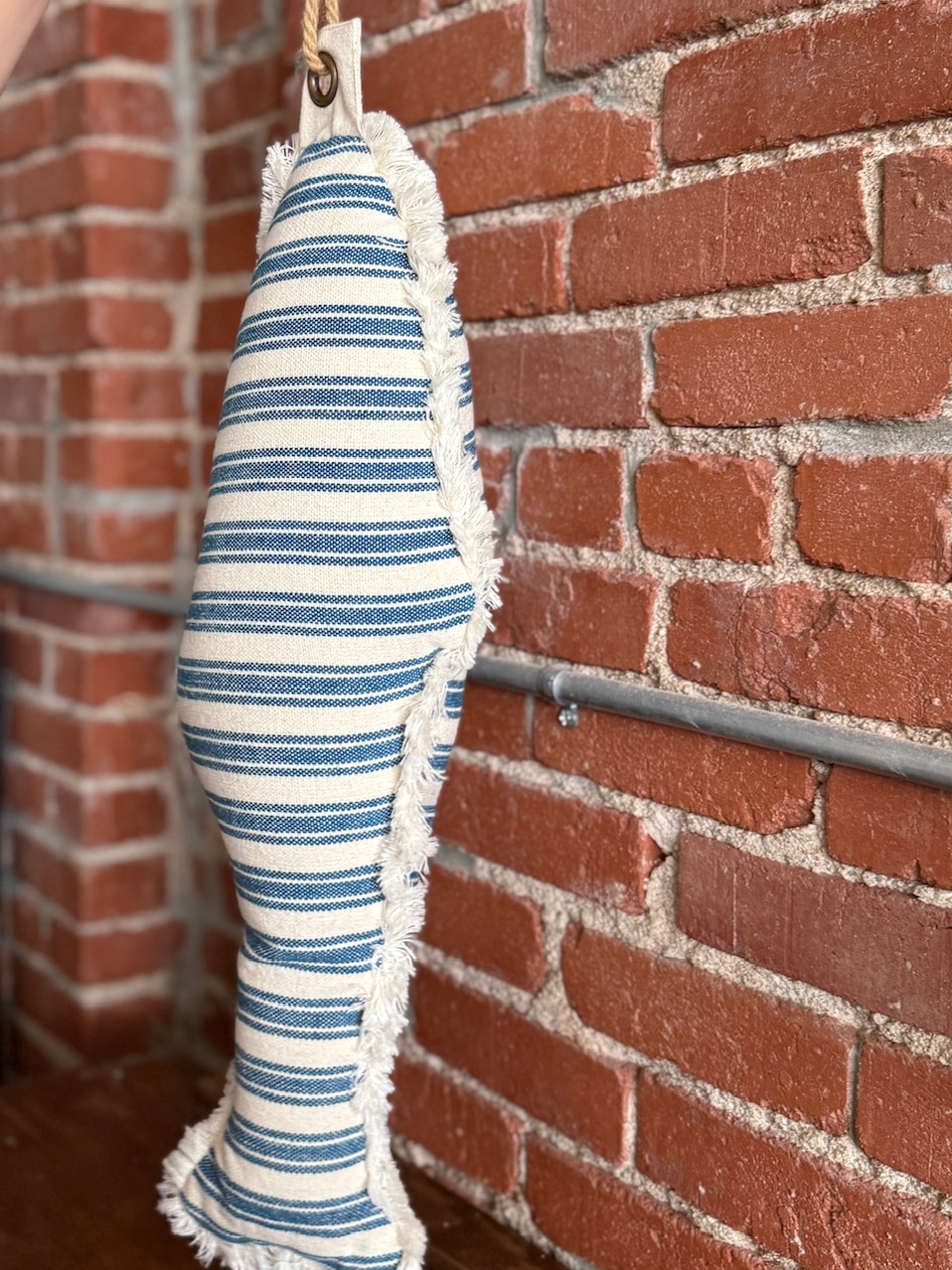 Striped Blue Fish Shaped Pillow with cotton and rayon blend fabric, decorative coastal design.