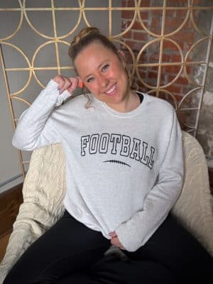 Relaxed unisex Football Crewneck styled for game day comfort