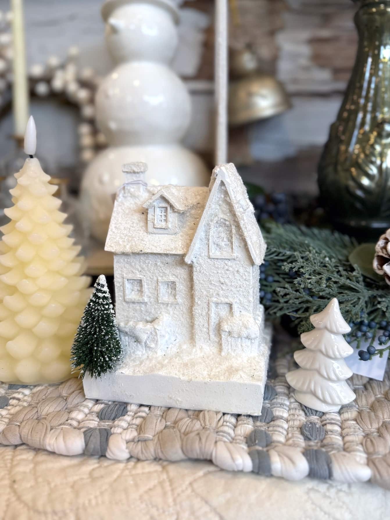 be-made-hays-ks-styled-left-frosty-white-christmas-house Frosty white Christmas house styled with bottle-brush trees and winter décor accents.