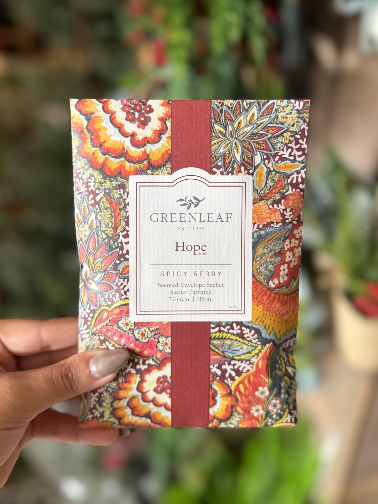 be-made-hays-ks-greenleaf-hope-scented-sachet Greenleaf Hope scented sachet packet with bold floral-pattern packaging held in hand.