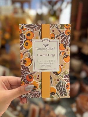 Greenleaf Harvest Gold scented sachet packet with autumn floral packaging held in hand.