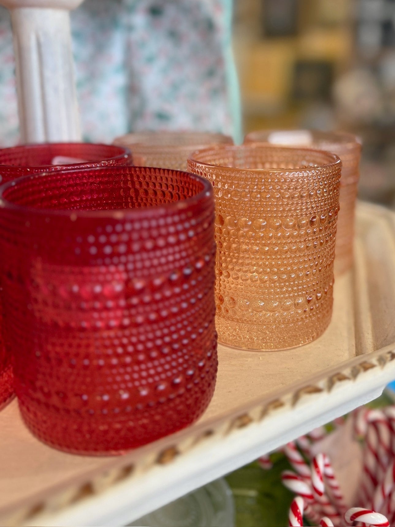 Rose Gold and Red Beaded Old Fashion Drinking Glasses displayed on a tray, featuring vintage-inspired texture and warm, festive tones.