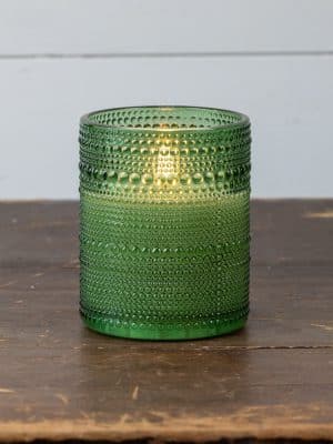 Green dotted glass flameless candle with lifelike 3D flame and timer, styled for holiday and everyday decor.