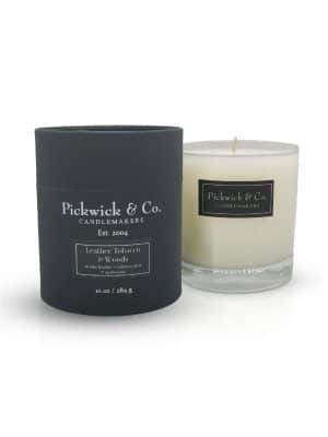 Leather Tobacco Woods Pickwick Candle in glass vessel with signature black box packaging.