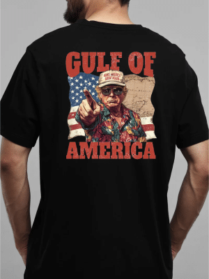 Black cotton t-shirt featuring a vintage-style “Gulf of America” graphic with a patriotic character, American flag, and retro map design on the back.