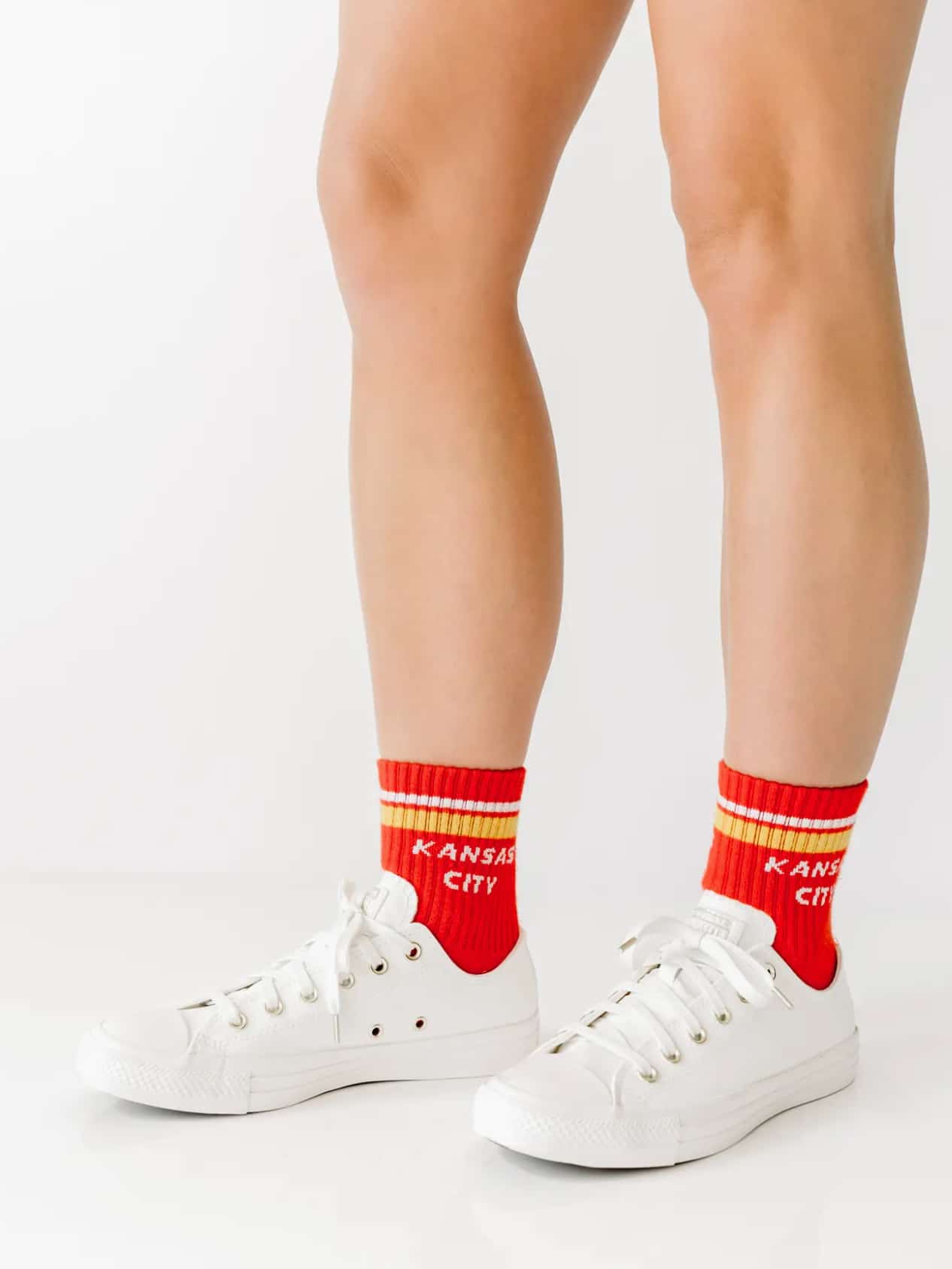 Red Kansas City crew socks with bold gold accents, perfect for Chiefs game day outfits.