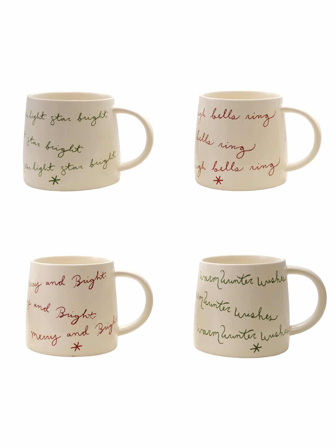 Set of four cream stoneware mugs with handwritten red and green holiday sayings: Sleigh Bells Ring, Winter Wishes, Merry & Bright, and Bright Star.