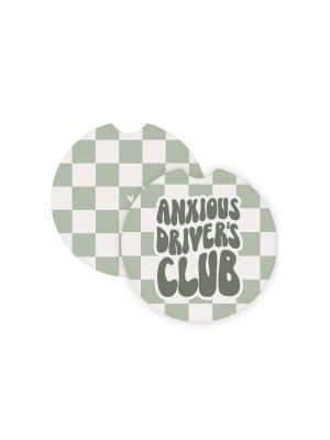 Round ceramic car coasters with a sage green and white checkered design and the phrase โAnxious Driverโs Club.โ