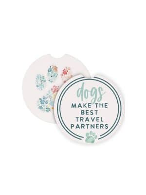 Round ceramic car coasters with colorful paw prints and the quote “Dogs Make the Best Travel Partners,” designed to fit in standard car cup holders.