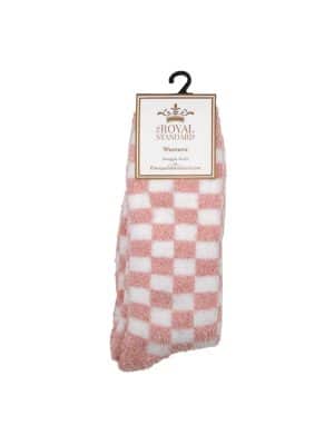 Pink and white checkered fuzzy socks with The Royal Standard packaging labeled “Women’s Snuggle Socks.”