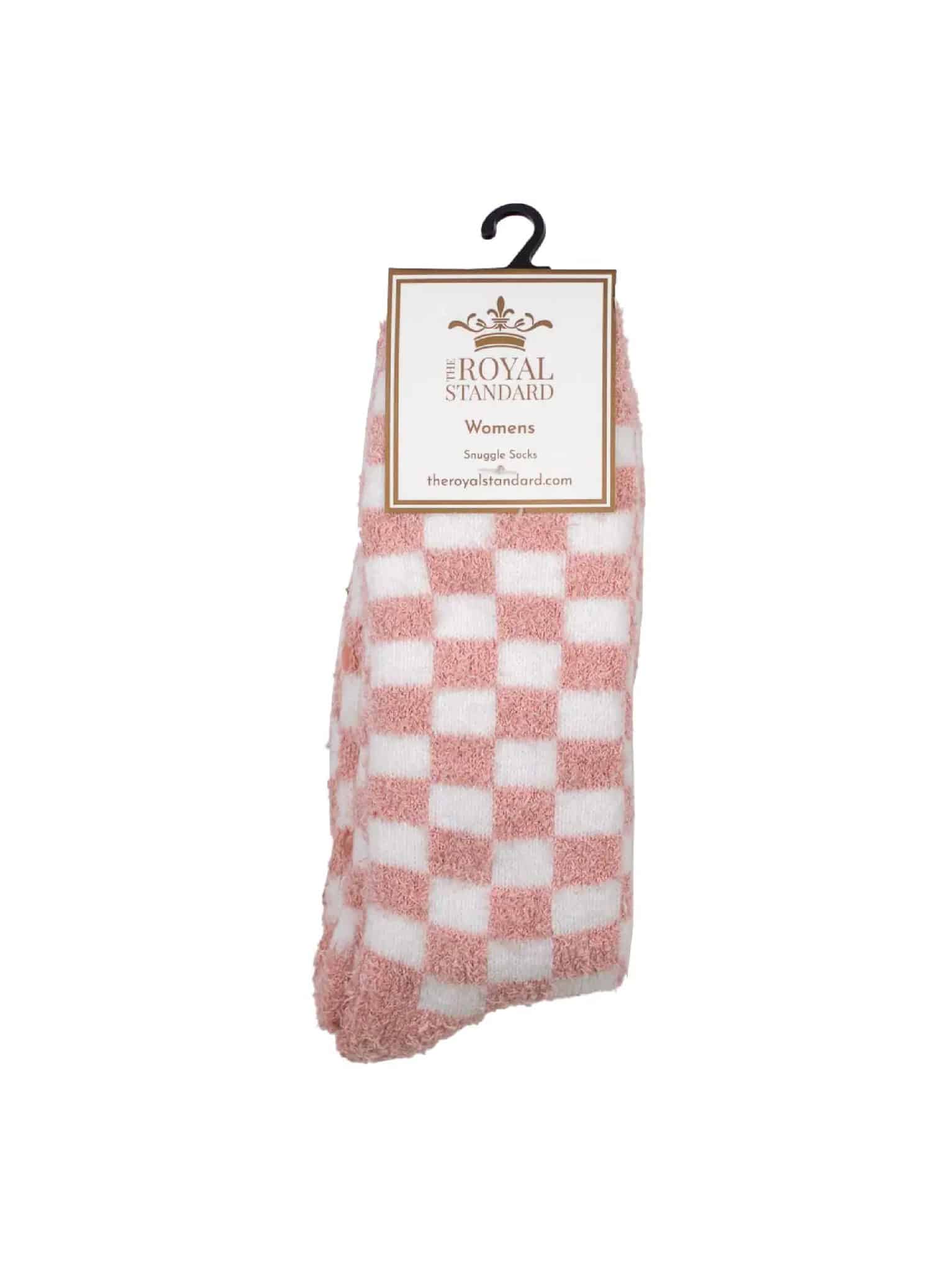 Pink and white checkered fuzzy socks with The Royal Standard packaging labeled “Women’s Snuggle Socks.”