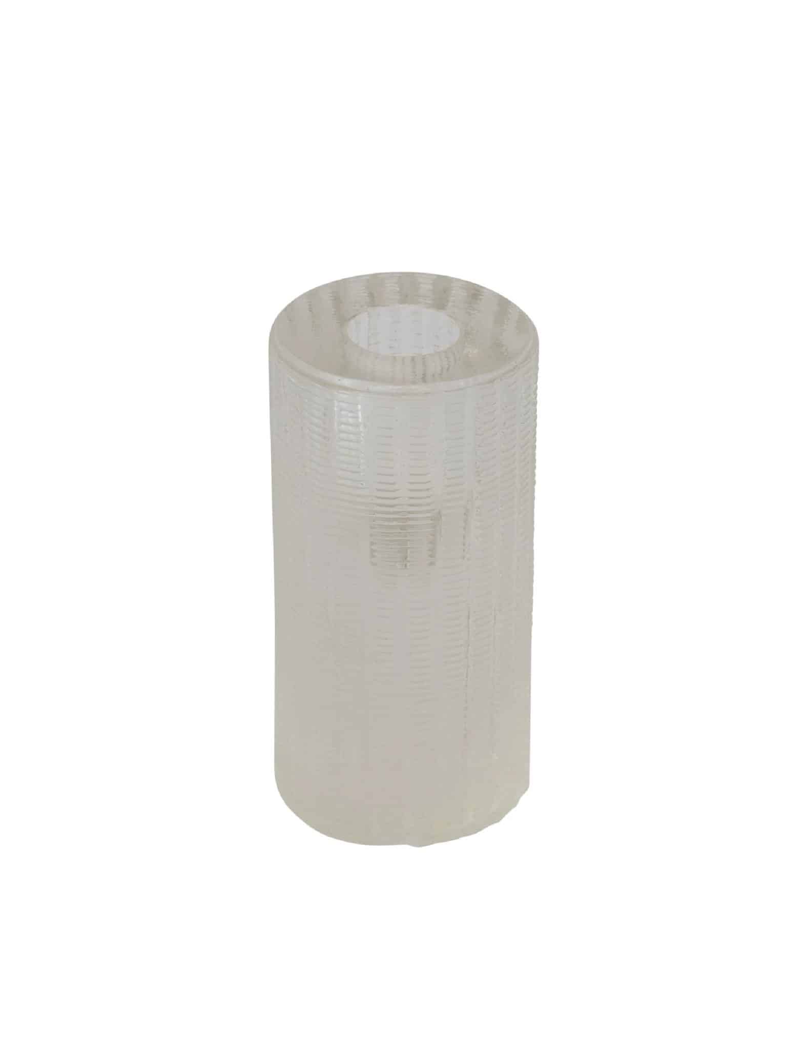 Close-up of clear cut glass taper holder showing the vertical etched texture and tall cylindrical shape.