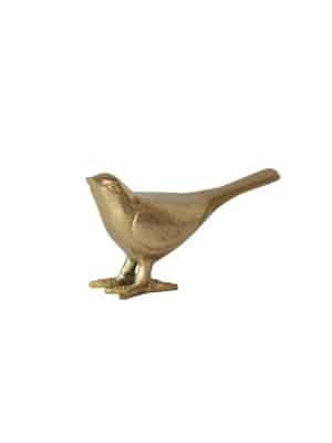 Smooth gold bird figurine made of cast aluminum displayed on a white background.