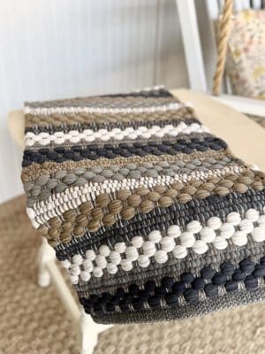Hartwick Chindi Table Runner hanging off table