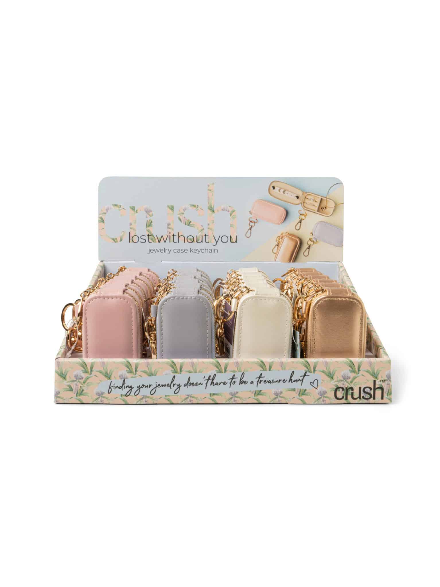 Jewelry Keychain display showing blue, gold, white, and pink mini cases with attached clips.