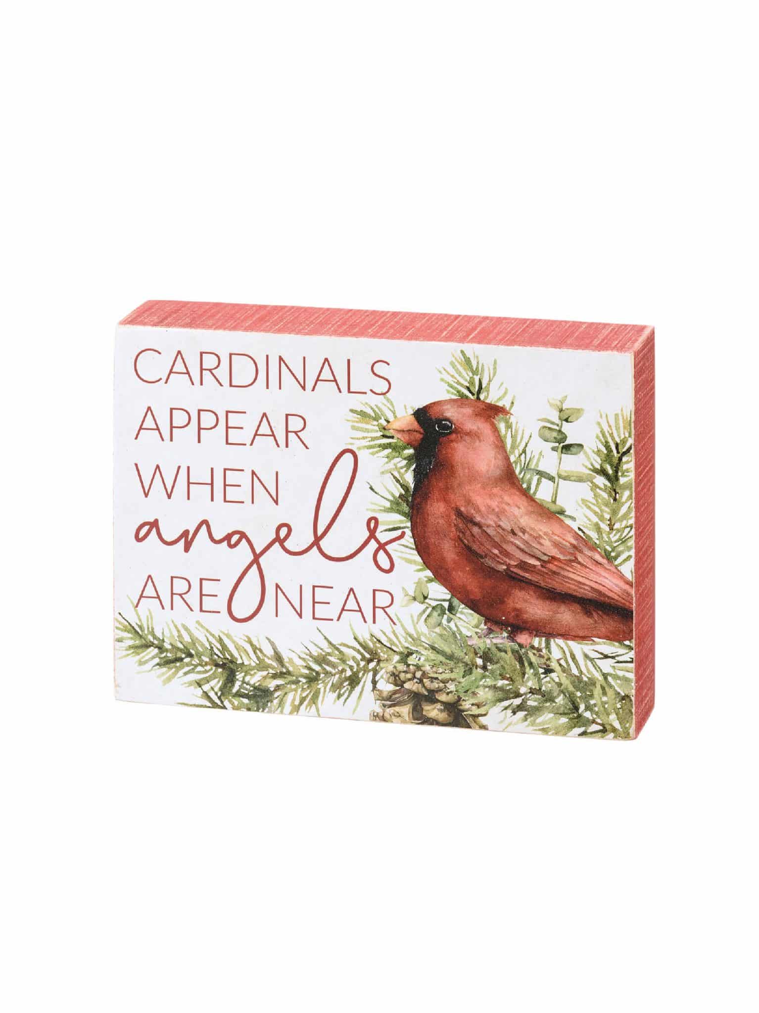 Wooden box sign with red cardinal and phrase “Cardinals appear when angels are near.”