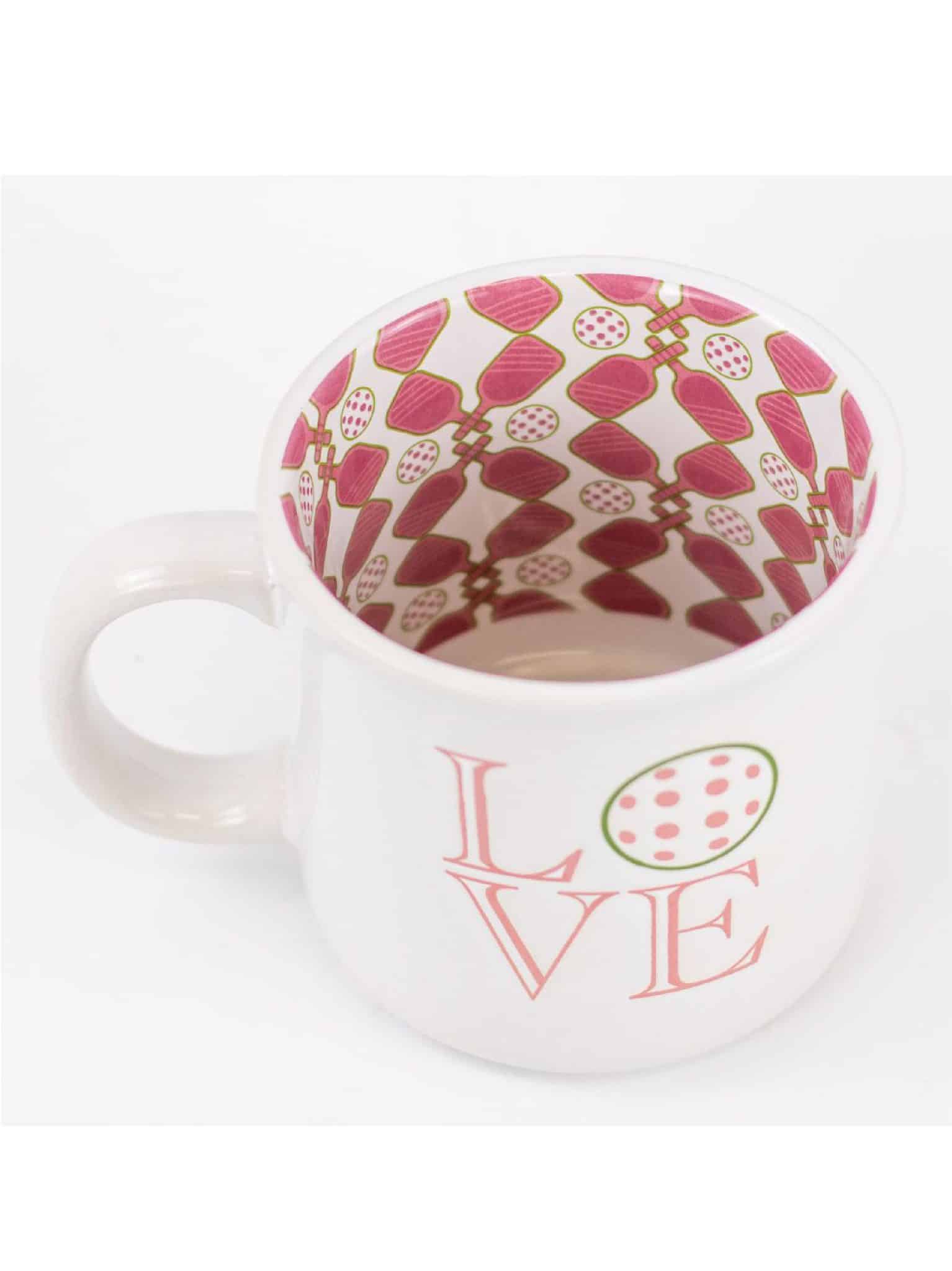 Close-up of Love Pickleball Mug interior showing pink pickleball paddles and balls pattern.