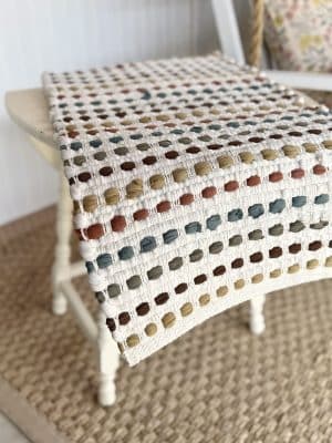 Ryland Chindi Table Runner hanging off table