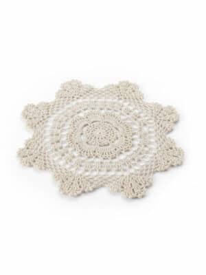 Vintage Cream Lace Doily in ecru cotton crochet with an intricate floral pattern and scalloped edges displayed on a white background.