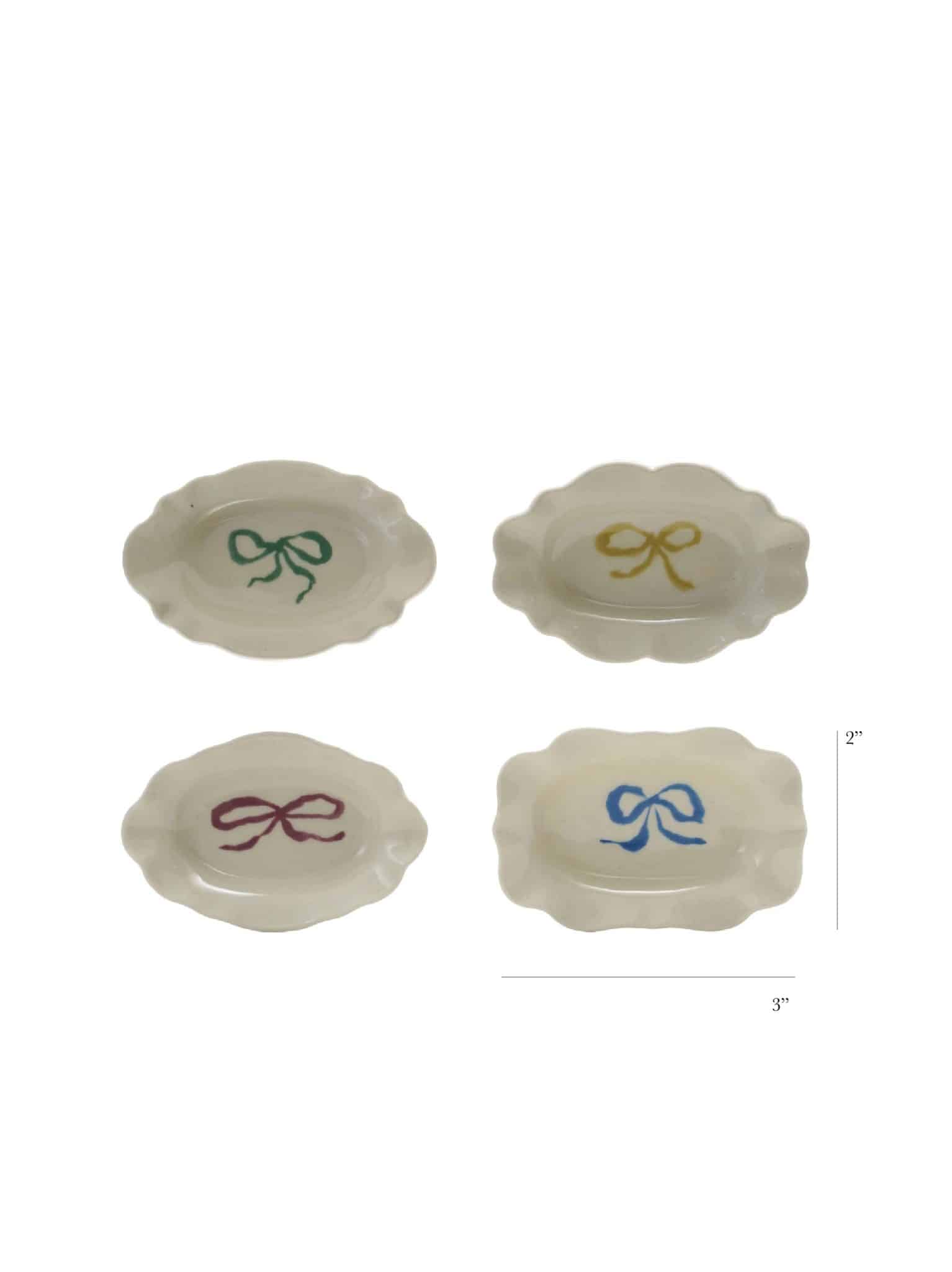 Bow Scalloped Trinket Dishes shown in all four colors on a white background.