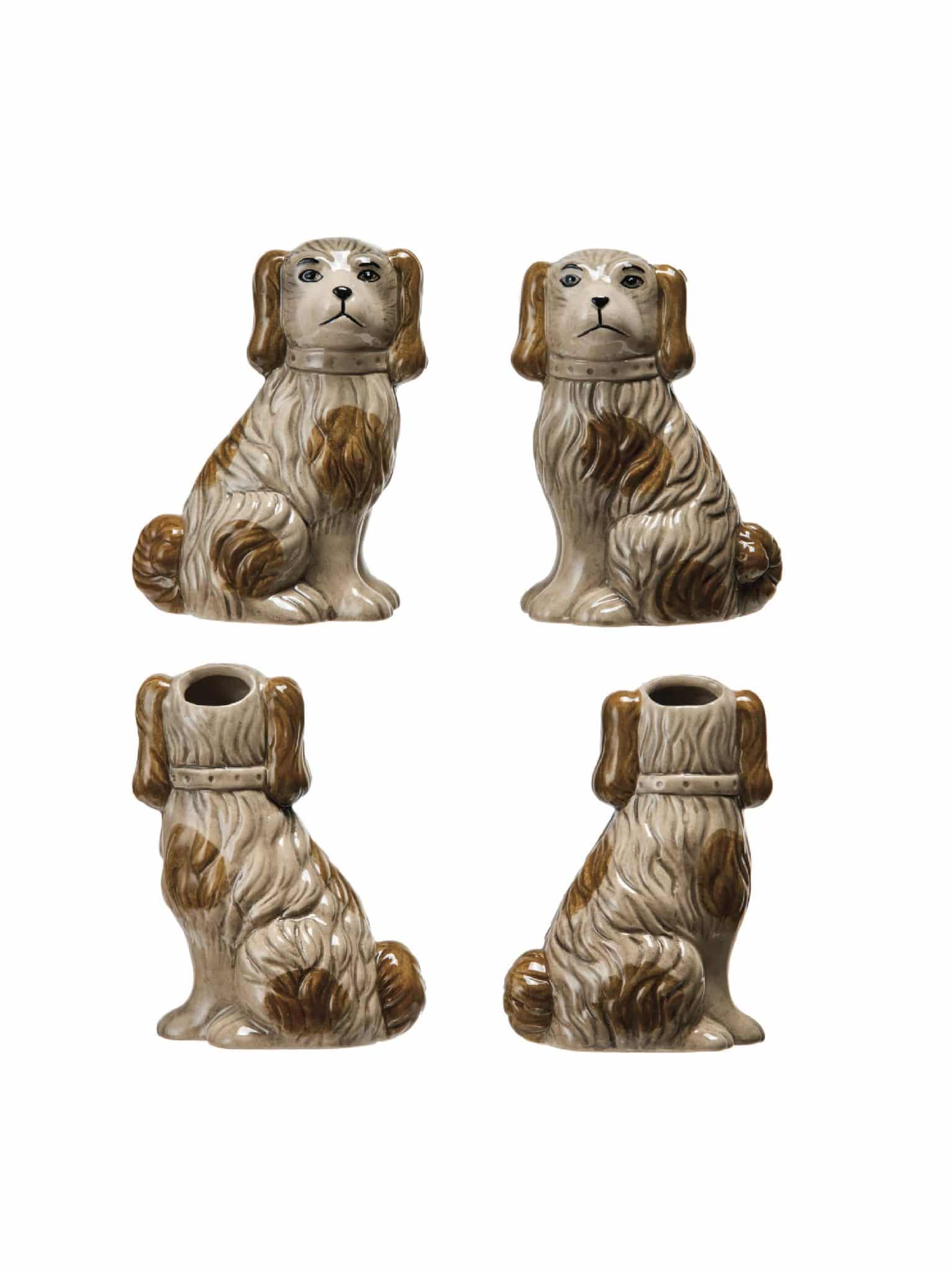 Pair of vintage English Staffordshire-style dog planters in warm brown tones shown together on white background.