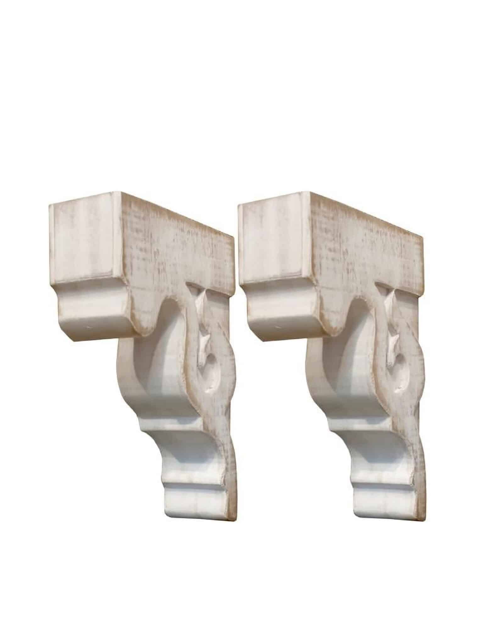 Two ivory corbel bookends shown from the top/side, highlighting carved bracket details and built-in slide-tab hangers for optional wall mounting.